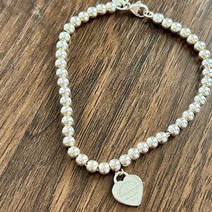 Tiffany & Co. Return to Sender Blue Heart Bracelet.